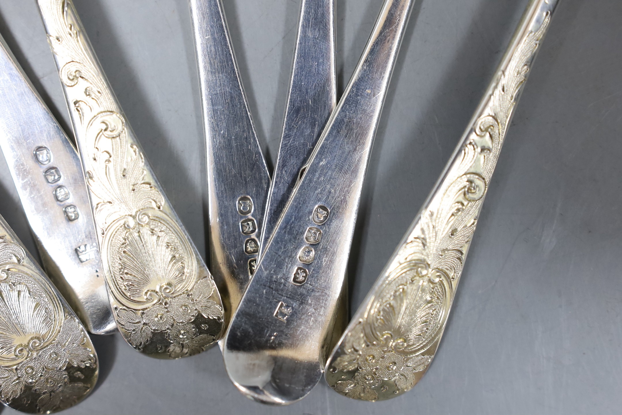 A set of four George III silver 'berry' spoons, by Eley & Fearn, London, 1805 and four earlier silver 'berry' spoons, marks pinched